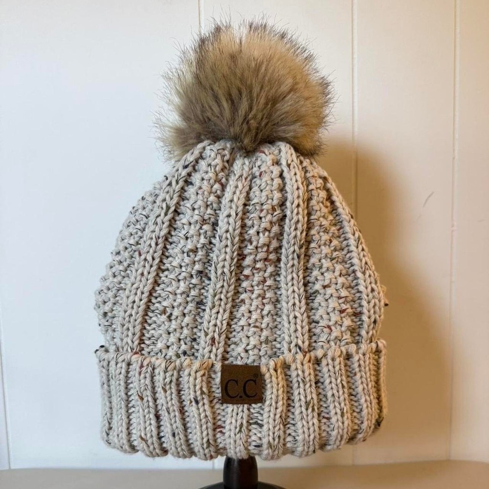 Thick C.C. fleece lined cream and tan pom pom beanie